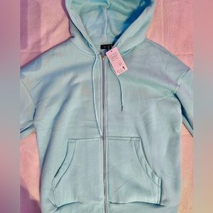 small light blue zip up
